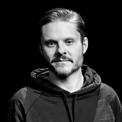 Photograph of a man on dark background